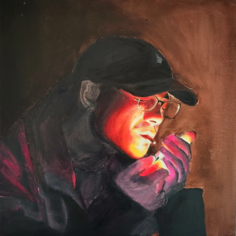 Oil portrait of a man in a cap and glasses lighting a cigarette, his face lit red by the flame